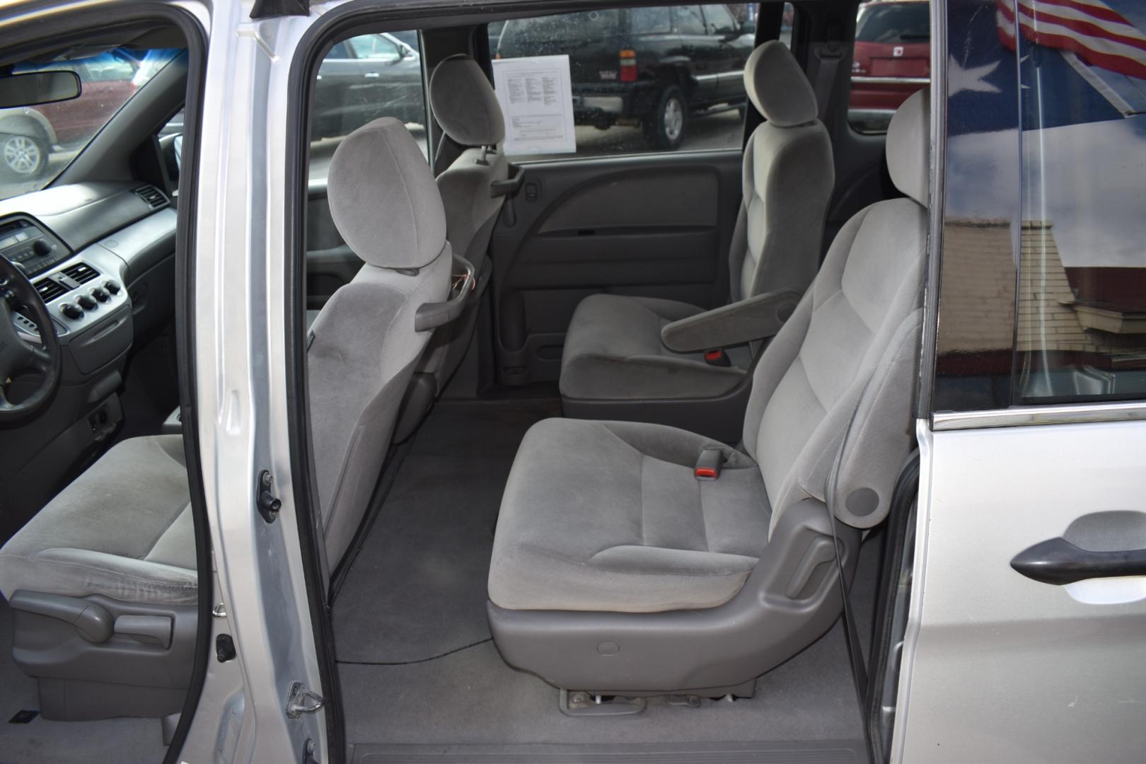 2010 Silver /Gray Honda Odyssey (5FNRL3H25AB) , located at 5925 E. BELKNAP ST., HALTOM CITY, TX, 76117, (817) 834-4222, 32.803799, -97.259003 - Buying a 2010 Honda Odyssey LX can offer several benefits, including: Reliability: Honda is known for its reliability, and the Odyssey is no exception. The 2010 model is likely to have a solid reputation for dependability. Safety: The 2010 Odyssey LX comes equipped with standard safety features su - Photo#18